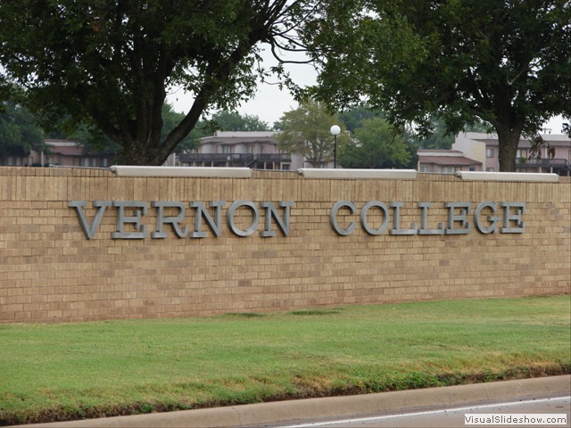 Entrance sign from College Drive