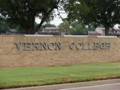 Entrance sign from College Drive